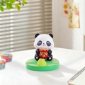 Cute panda figurine holding a red money bag with gold coins on a green base - Daily Wealth Panda Stand (1081-13)