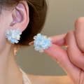 Detailed close-up of light blue resin flower earrings with delicate translucent petals - Light Blue Resin Flower Studs (16#)