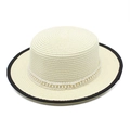 Detailed close-up of white straw boater hat with black rim and elegant pearl chain trim - Milky White Pearl Chain Style