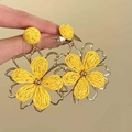 Detailed close-up of handmade yellow woven flower earrings with gold metal frames - 28# Silver Pin - Gold - Yellow
