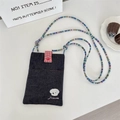 Detail of denim crossbody bag featuring dog embroidery and colorful beaded strap - Dark Blue Dog