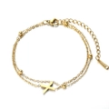 Double-layered golden stainless steel bracelet featuring an X-shaped pendant and round beads - Letter X