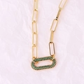 Close-up of gold paperclip chain necklace with green pave-set zircon oval link - Oval Green Zirconia Necklace