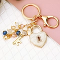 Golden heart lock keychain with marble resin charm, clover and colorful crystal beads - White Clover Heart Lock