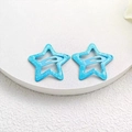 Pair of blue star-shaped glitter BB hair clips for girls with a shiny finish - Glitter Blue Star