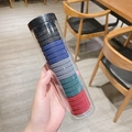 Multi-colored seamless high elasticity hair ties in a clear cylinder storage container - Dark Color B