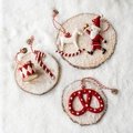 Three red and white Nordic Christmas ornaments with drum, Santa and pretzel motifs - Display Set 1 (17 PCS)