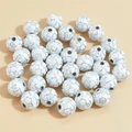 White football shaped acrylic beads with silver details for DIY jewelry making - 10mm Football Black Background Silver Line