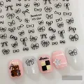 Adhesive nail art stickers featuring elegant black bowknot designs model YO-004 - YO-004 Black