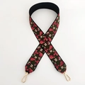 Close-up of vintage floral embroidery on wide strap with gold metal lobster clasps - White Pink Flower