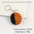 Realistic PVC waffle cookie keychain in dark chocolate and orange with measurements - Two-tone Wavy Chip Keychain