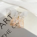 Transparent champagne gradient butterfly hair claw clip made of resin on a book - Gradient Orange Butterfly Claw Clip / Gradient Orange