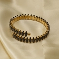 Adjustable 18K gold-plated spiral bracelet with marquise-cut black crystals - Black