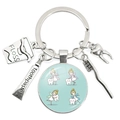 Silver metal dental keychain featuring toothbrush, toothpaste, tooth and floss box charms - Tooth Fairy Interaction Illustration (11)