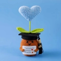 Handmade crochet graduation flower pot with orange base, blue heart, and 2025 mortarboard - Graduation Cap Heart Blue