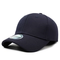 Classic navy blue fitted baseball cap with curved brim and silver sticker on white background - One Size / Navy Blue