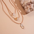 Detalle de los colgantes de cristal natural blanco y amarillo en cordón marrón - Blanco (Conjunto de 3)