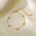 Elegant gold-plated stainless steel bracelet featuring five round white pearls for women - Five Pearl Bracelet (QYE2280)