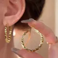 Polished gold textured hoop earrings with sparkling faceted finish for a chic look - A2259 Gold Etched Giant Hoops