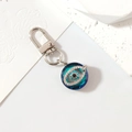 Silver crystal evil eye keychain with blue rhinestone accents for bags and accessories - Silver Oval Eye