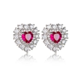 Detail shot of heart-shaped ruby earrings with micro-pave cubic zirconia on silver - Red Sapphire Earrings