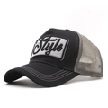 Detail of 3D Style embroidery and contrast stitching on a black and grey trucker hat - Gray