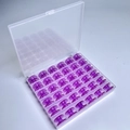 36 Purple Bobbins In A 36-compartment Box / Shuttle Core Storage Box
