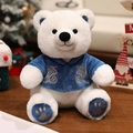 Plush polar bear in blue velvet coat with gold embroidery and festive holiday background - Style A - Blue Jacket