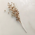 Close-up of golden glitter berry stems for Christmas DIY floral decoration and home decor - Champagne Gold