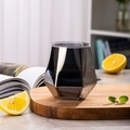 Smoky grey hexagonal whiskey glass on wooden tray with fresh lemon and mint - Grey Hexagonal Cup