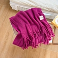 Knitted magenta scarf for women featuring a long fringe and a minimalist handmade label - Rose Red