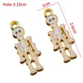 Cute skeleton charms in gold plated alloy and white enamel for DIY Halloween jewelry - White Skull
