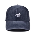 Close-up of white horse embroidery on vintage washed denim baseball cap with fine texture - Navy Blue