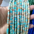 Detailed macro view of 3x6mm natural blue turquoise spacer beads for DIY jewelry making - Natural Imperial Jasper 2