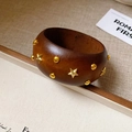 Detail of dark brown wooden bangle with golden star studs on textured background - Coffee Gold Star Rivets (21#)