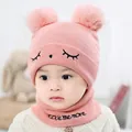 Pink knit baby hat and scarf set with two fur pom-poms and cute embroidered expression - One Size / Squinting Style / Pink