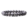 Macro detail of natural gray marbled stones and engraved silver spacer bead on a beaded bracelet - Map Stone