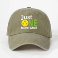 Close-up of khaki washed cotton baseball cap with Just One More Game pickleball print - Dark Khaki
