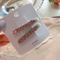 Detail of elegant hair clips with pink rhinestones and light green resin bases - Full Rhinestone White Pink Pair