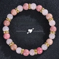 Detailed top view of pink strawberry quartz and garnet beaded bracelet on black leather - Love Spell Style D (LOVE SPELL-D)