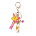 Detailed letter T keychain with dried flowers, gold foil, and pink tassel decoration - Flower Pattern T