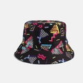 Detailed view of vibrant geometric and animal print patterns on this black bucket hat. - M / Retro Geometric Pattern Style