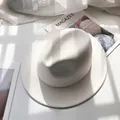 Detail of white wide-brim wool fedora hat with elegant stitching and a classic indented crown - M (56-58cm) / White