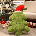 Green plush Christmas tree doll with Santa hat and smiling face holiday pillow - Red Hat Tree