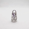 Macro detail of silver hollow filigree spacer bead with top ring for DIY jewelry making - Medium Short Cap