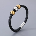 Bracciale intrecciato in pelle nera da uomo con perla argentata e dettagli dorati - Bracciale Nero