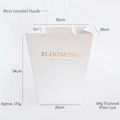 White trapezoid gift bag with gold embossed logo and soft silk handles for flowers - Double-sided Embossed Trapezoidal Gold