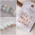 Luxe light blue rhinestone and gold nail charm set with MJ-019 model display - MJ-019 Gold Foil Style