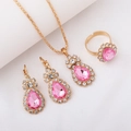 Elegant gold jewelry set with pink teardrop crystals and small white diamonds - Three-Piece Set / Waterdrop-Pink