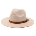 Detail of straw fedora hat featuring woven texture and brown suede band with tassel - M (56-58cm) / Light Pink